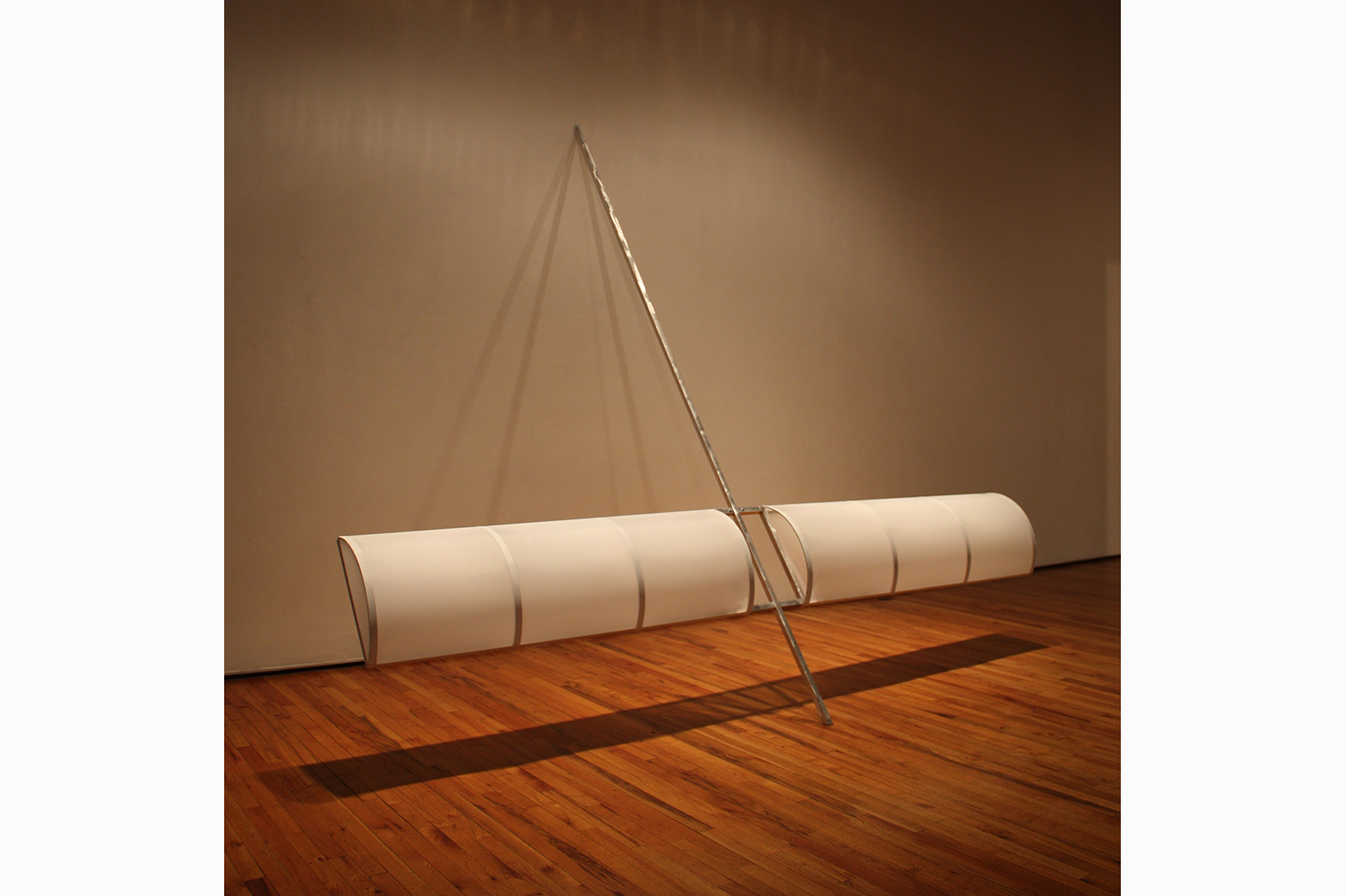 Balancing Act132”h x 135”w x 7”d; extends 77” out from wall; stands 96”h on wall